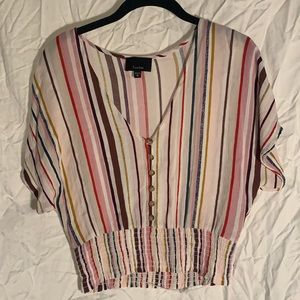 Boutique top with flowy vibes & a fitted waist